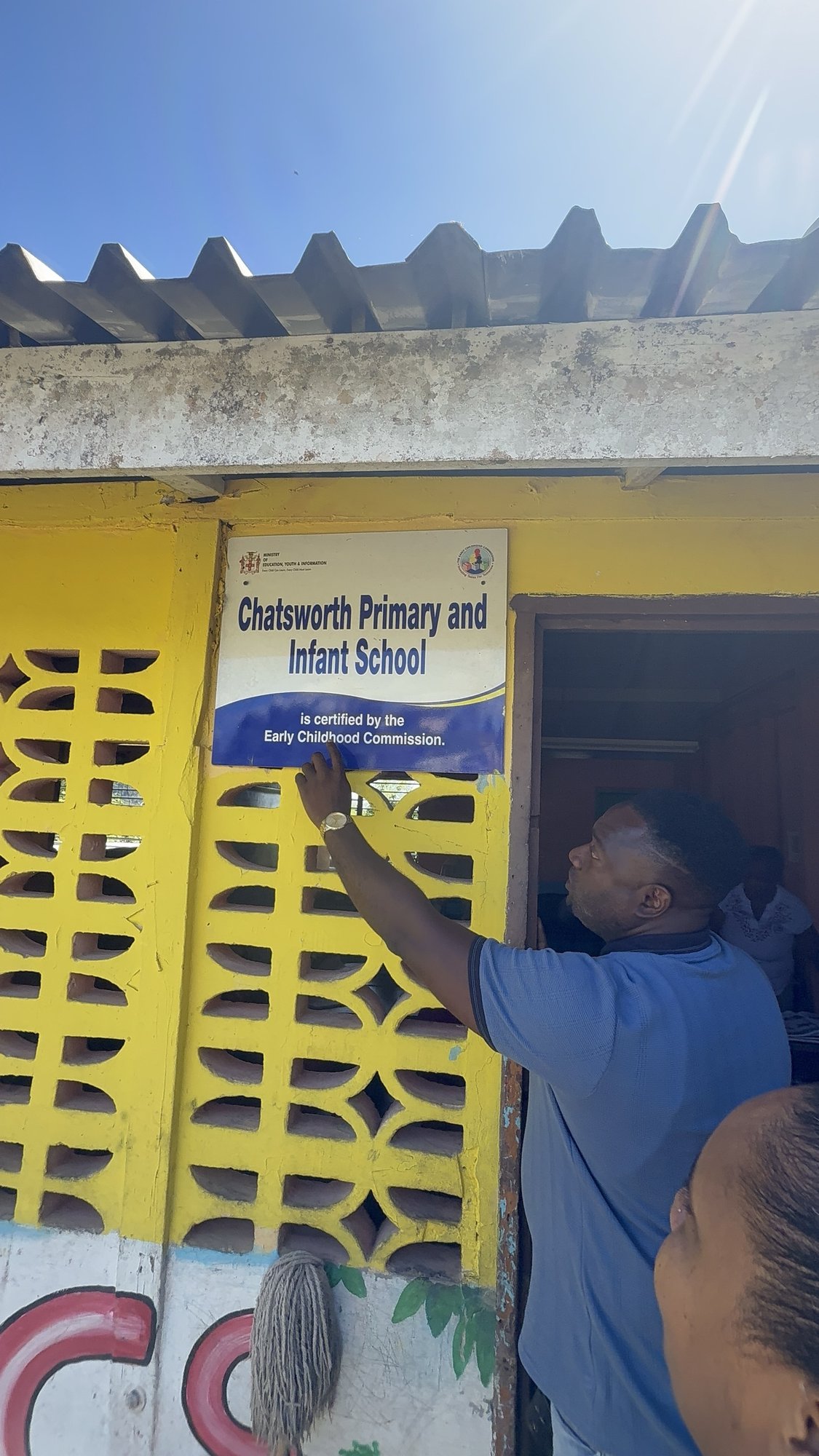 Early Childhood Commission certification sign at Chatsworth Primary and Infant School.